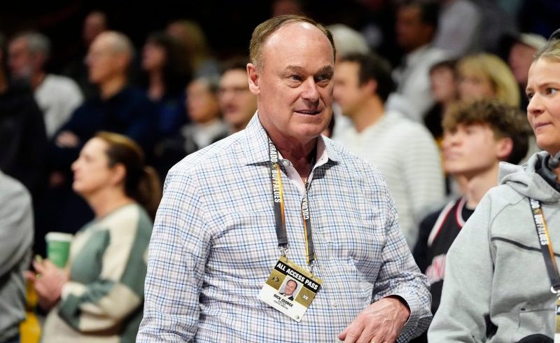 Colorado athletics director who hired Deion Sanders to step down next year