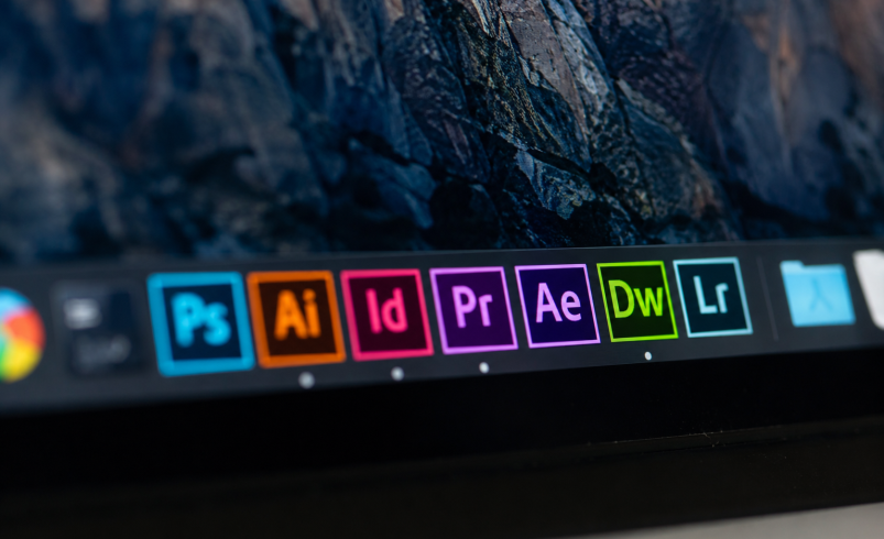Why is Adobe stock sliding today despite earnings beat?